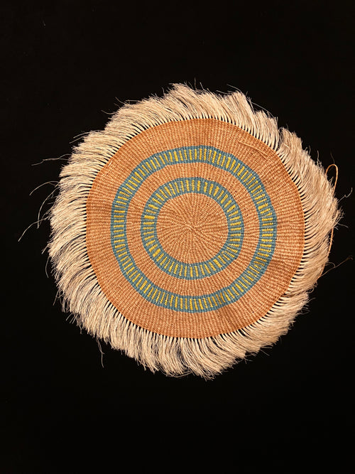 Hand woven grass mats from Kenya