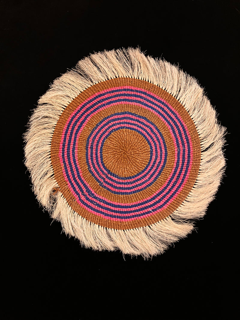 Hand woven grass mats from Kenya
