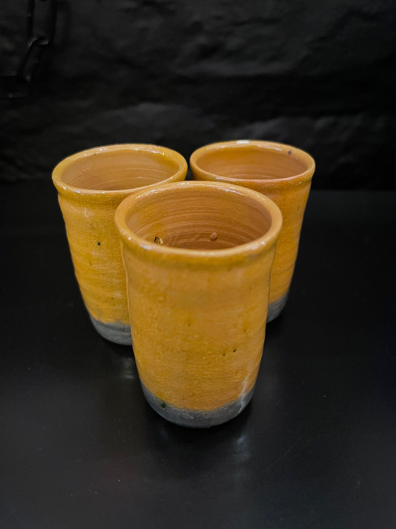 Tiny clay cups