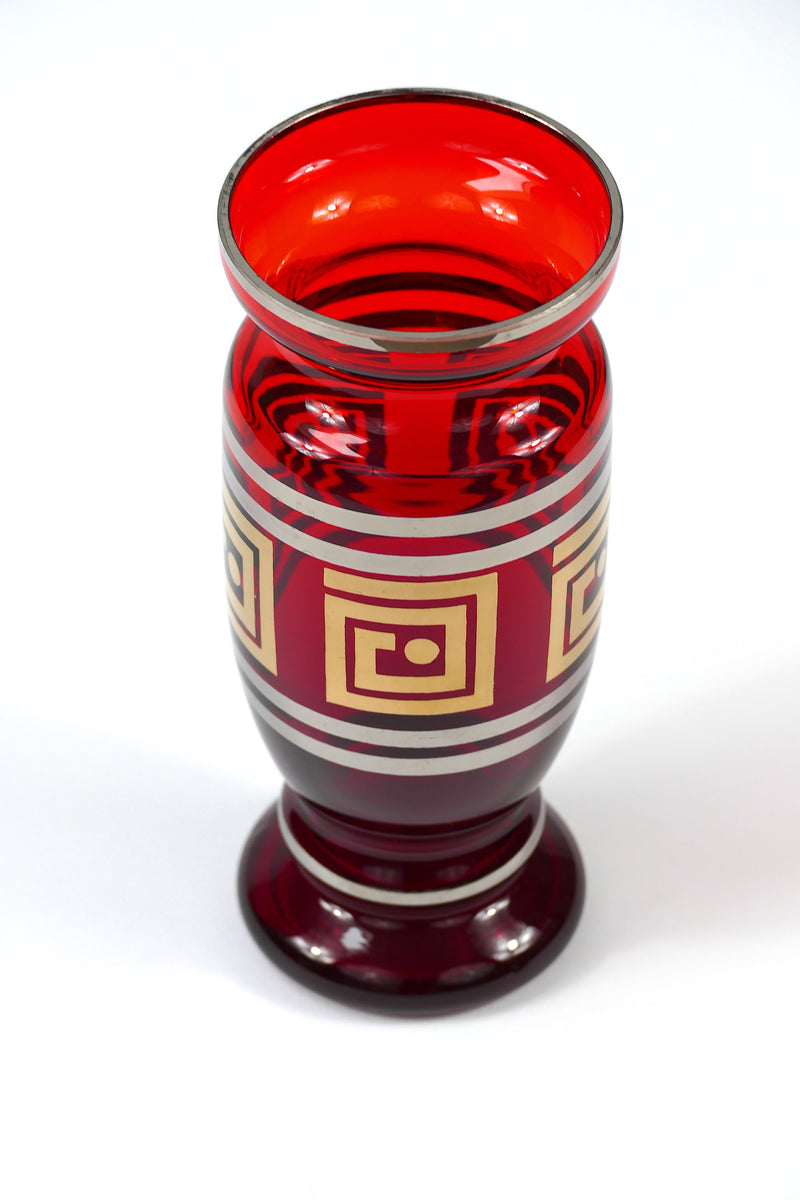 Ruby red glass vase with gold and silver design