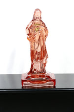 Pink glass Jesus candlestick holder